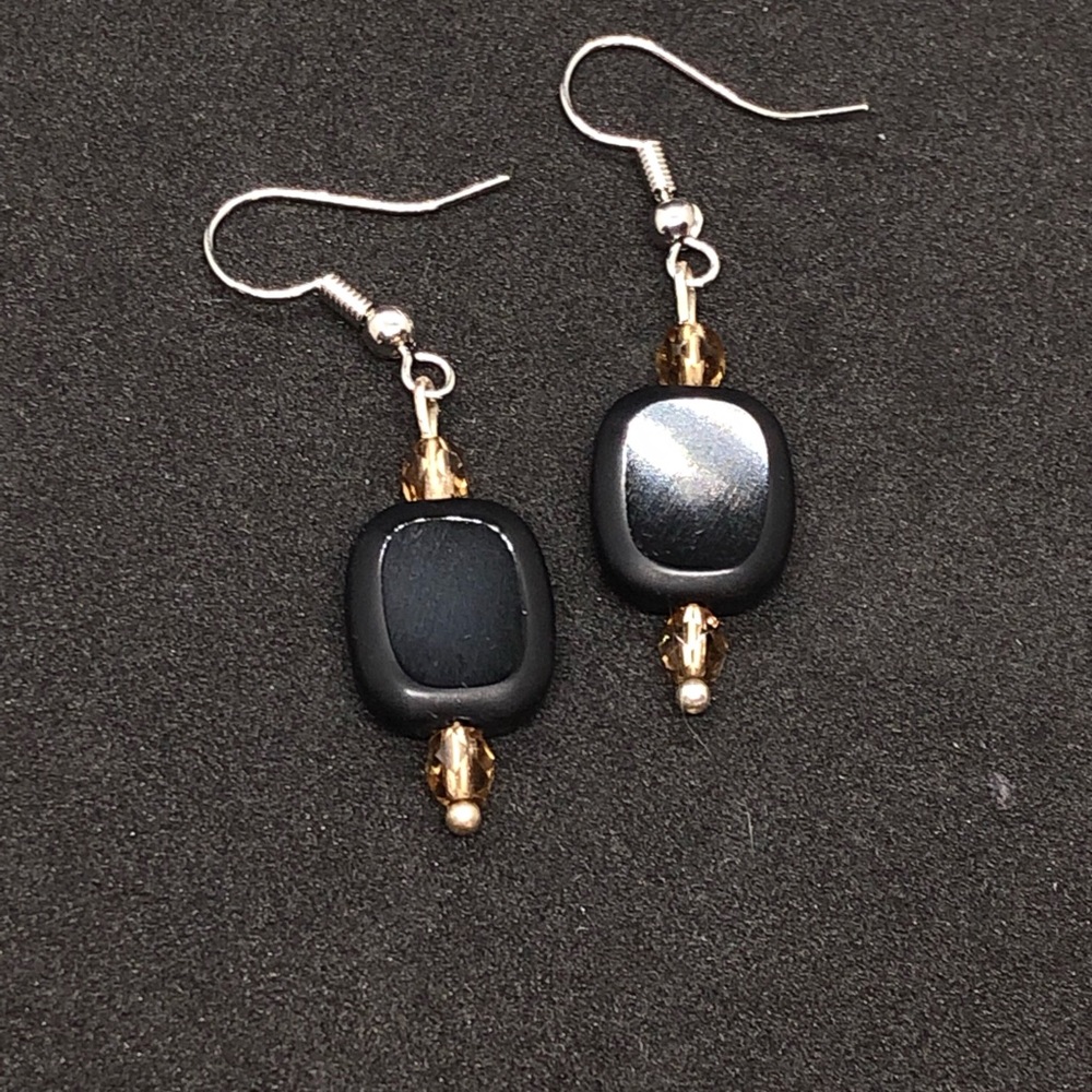 Champagne and caviar black and gold earrings!